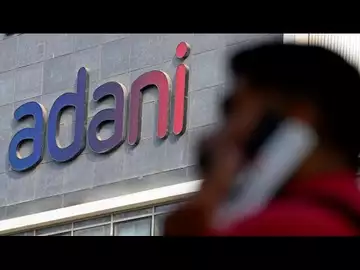 Adani Pledges to Tackle Debt Deadlines