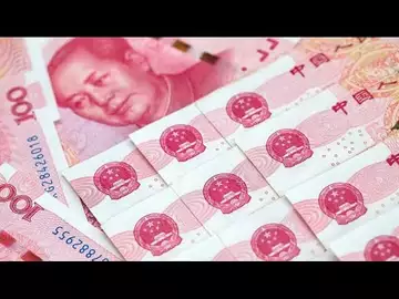 China Warns Yuan Speculators They Will Lose Money in Long Term