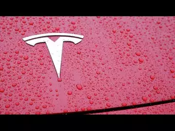 Tesla Downgraded by Wells Fargo on EV Volume Risks