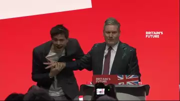 Protester Rushes Labour's Starmer on Stage