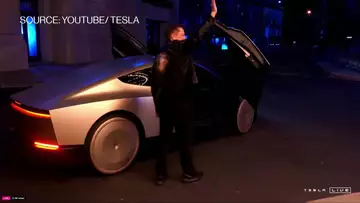 Musk Shows Tesla Cybercab, Sees 2026 Debut