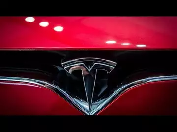 Tesla Earnings Miss Forecasts, Warns About Slower Growth