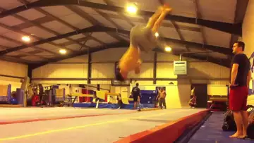 Standing Backflip to punch front  1 1\2 Twist