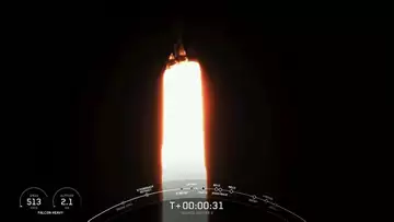 SpaceX Falcon Heavy Rocket Carries Massive Satellite Into Orbit