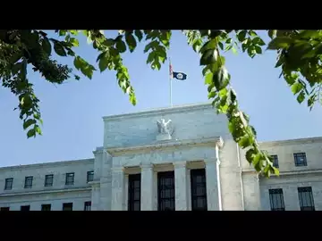 Fed Pauses Rate Hikes, Signals More Tightening Ahead